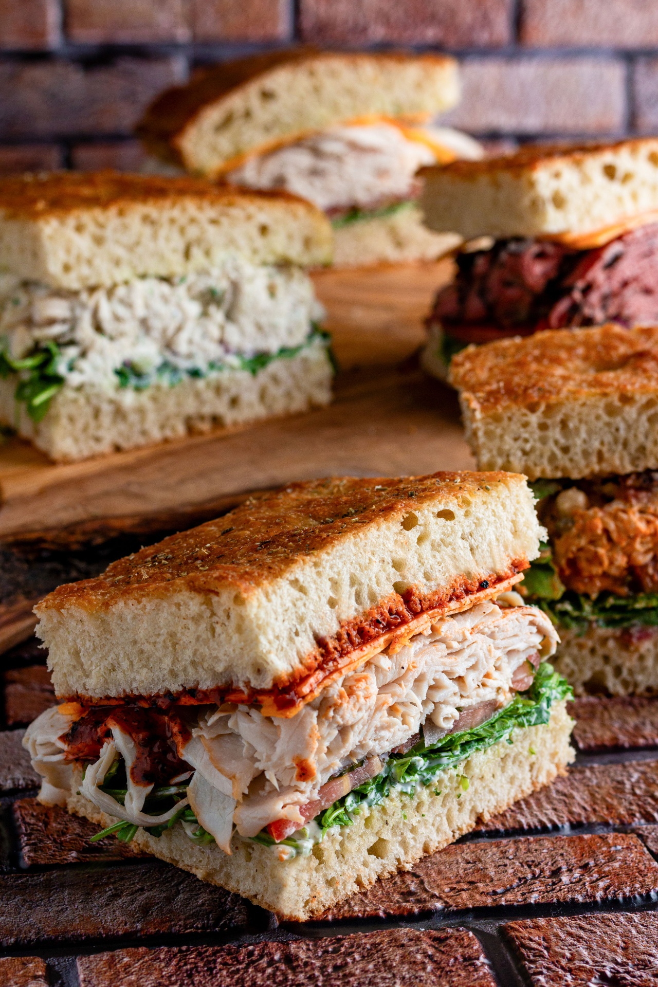 Focaccia sandwiches with turkey, chicken salad, and roast beef
